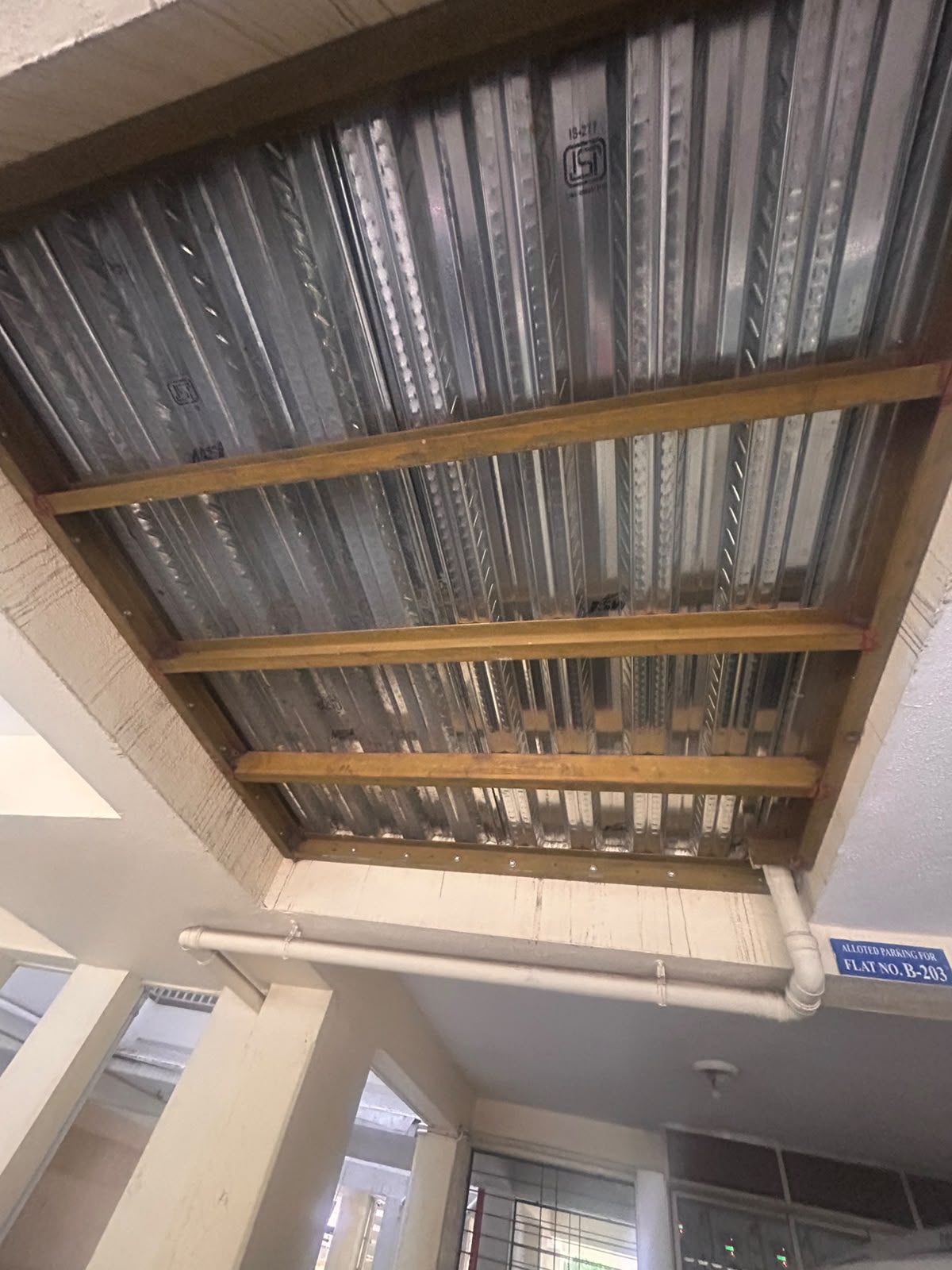 Apartment balcony extension custom steel beam and profile decking sheet fabrication in Pune