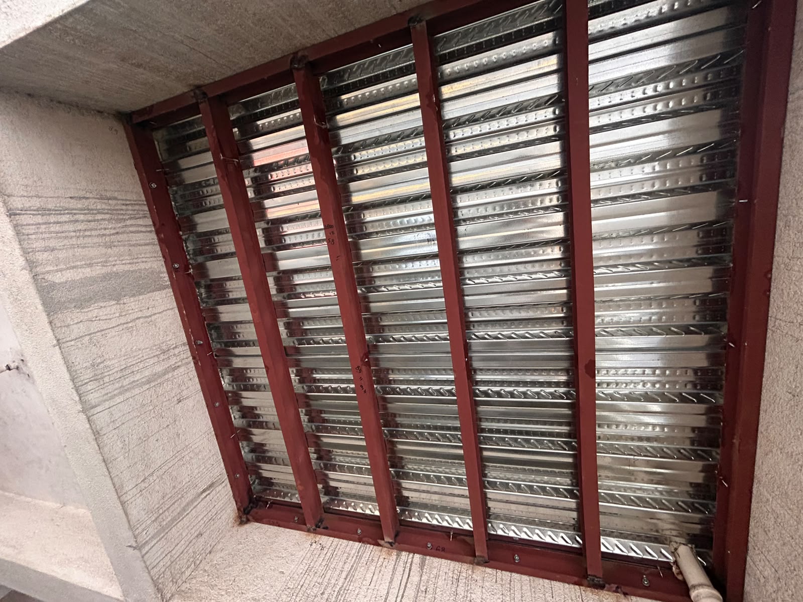 Heavy MS structural steel frame and corrugated decking sheet support structure for balcony extension